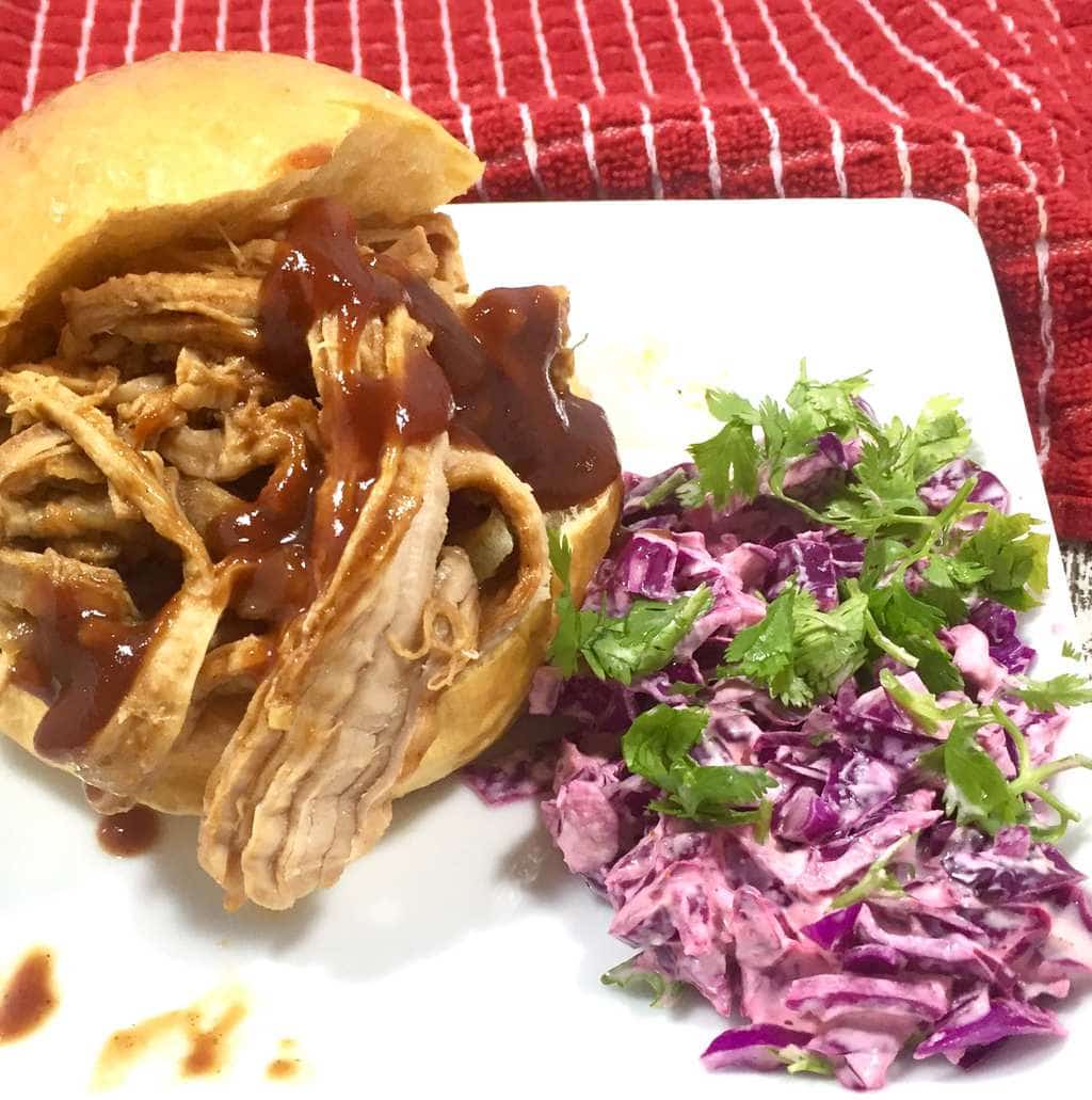 This Slow Cooked Sriracha BBQ Pork is perfect for the best spicy pork sliders youâ€™ll ever eat.Â And even better is how easy this recipe is to make.