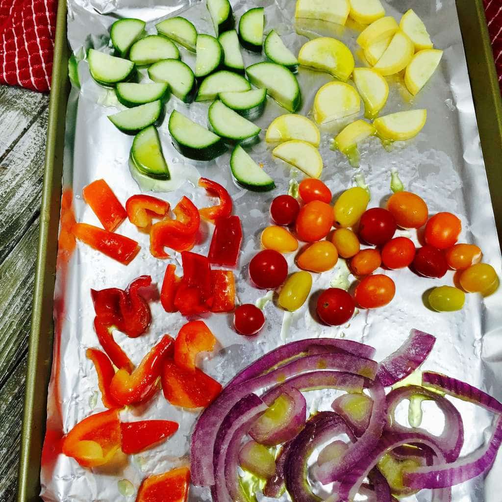 Mixed vegetables on a sheet pan ready fir roasting