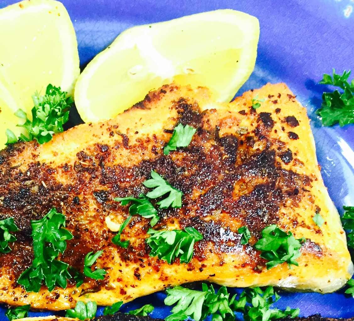 Blackened Salmon on a blue plate