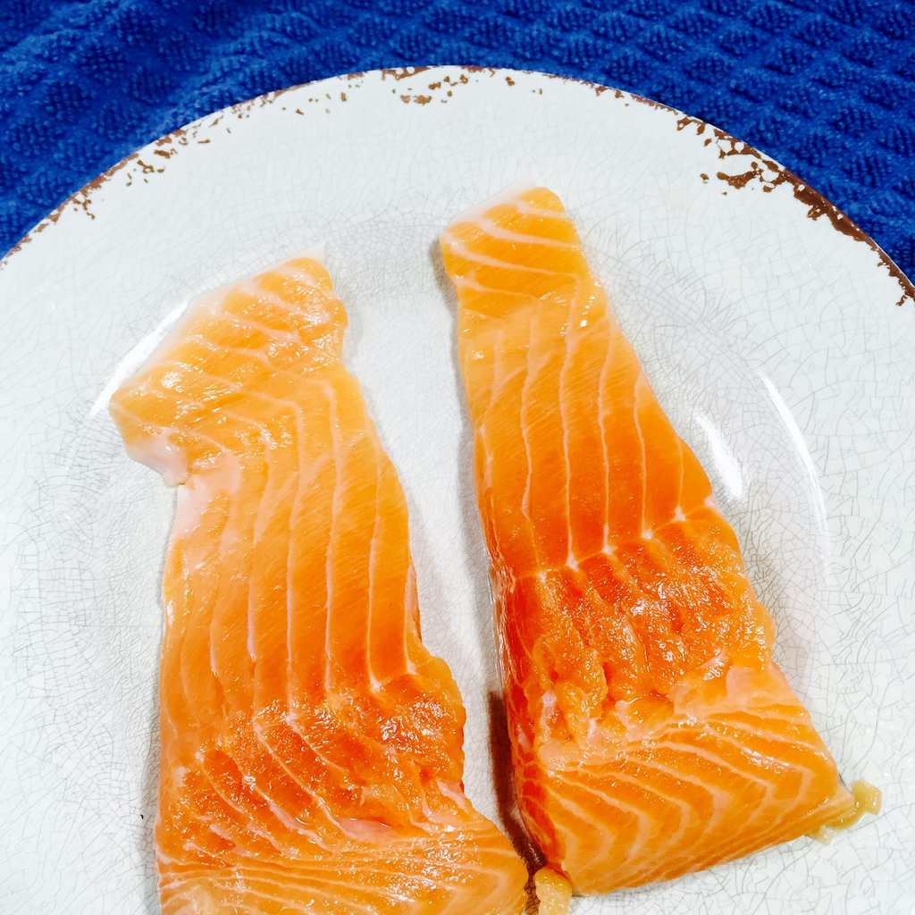 Salmon filets on a white plate