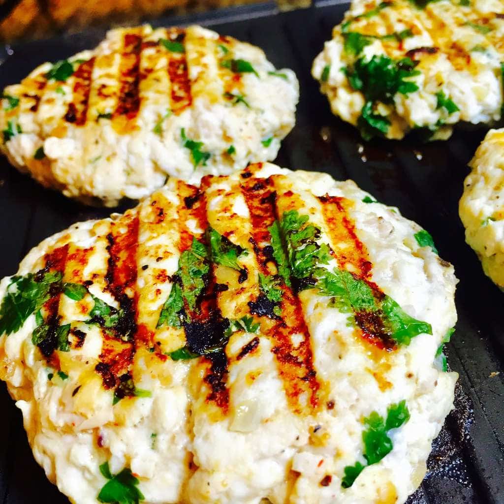 Turkey burgers grilling