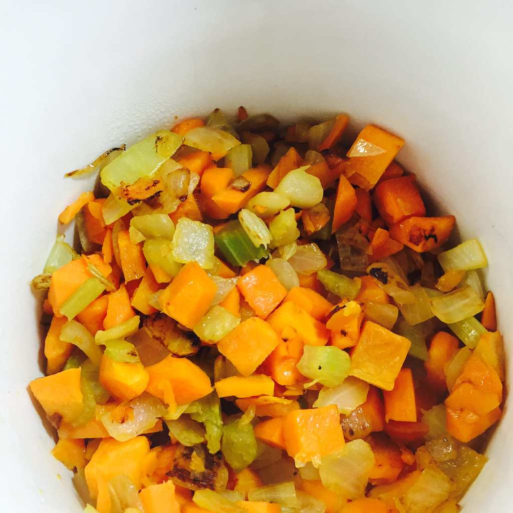 Cooked celery, carrots and onions in a Crockpot