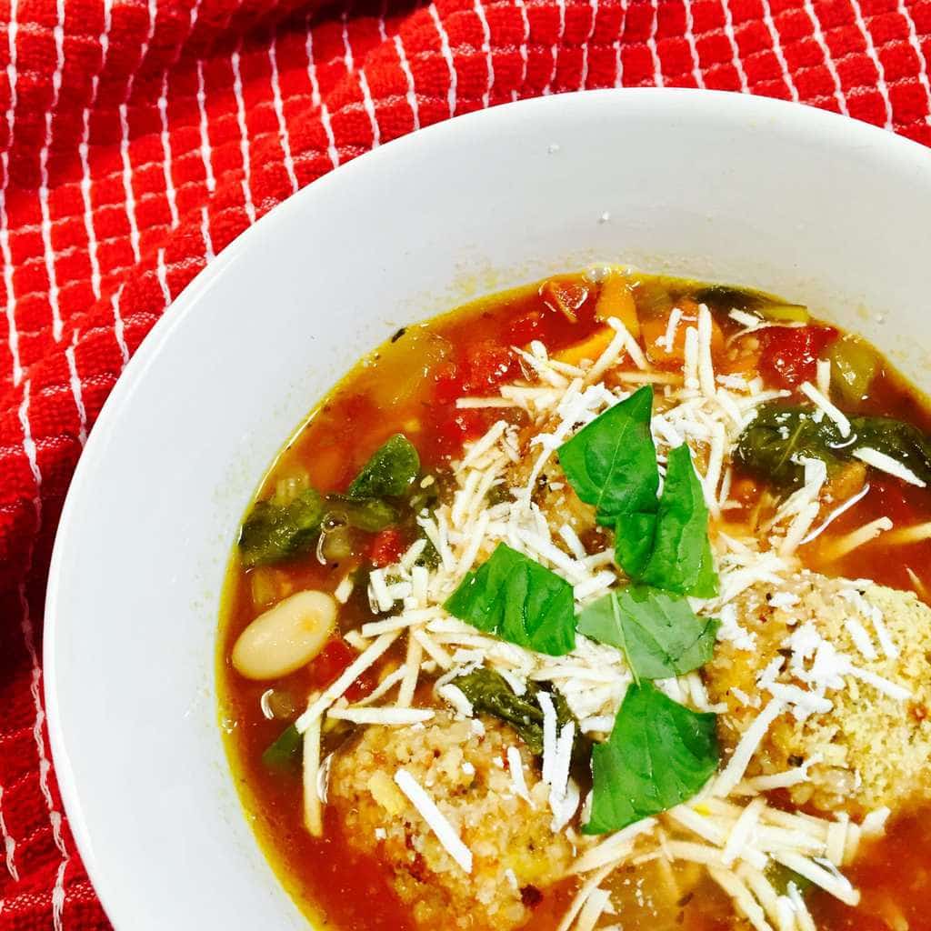 Tuscan Chicken Soup in a white bowl