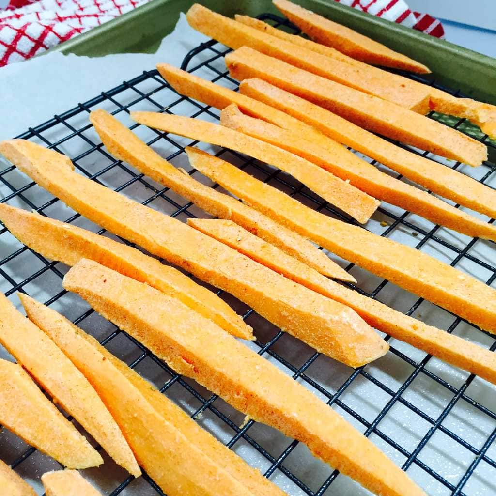 Sweet potato fries on an oven rack