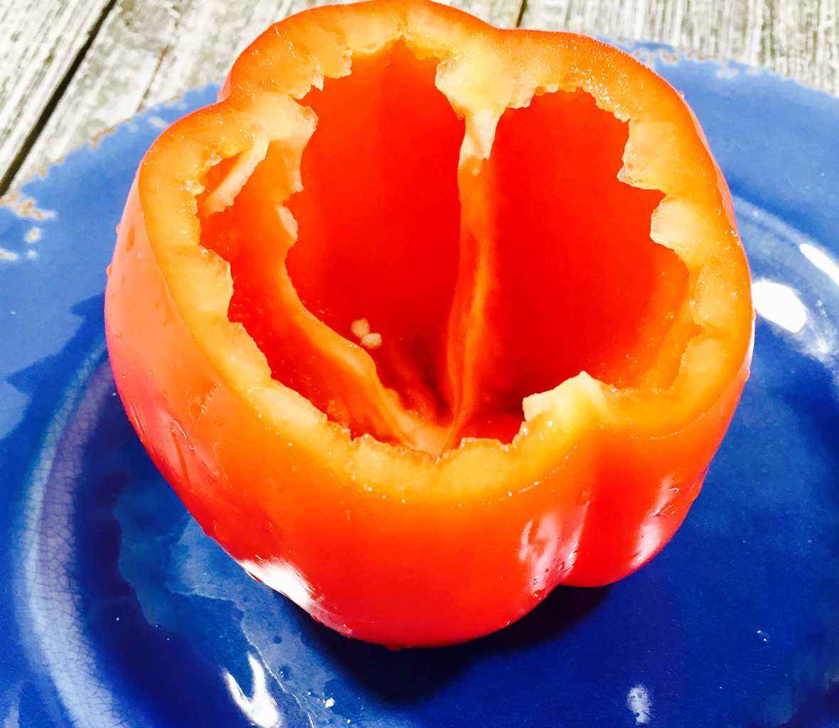 Red pepper on a blue plate