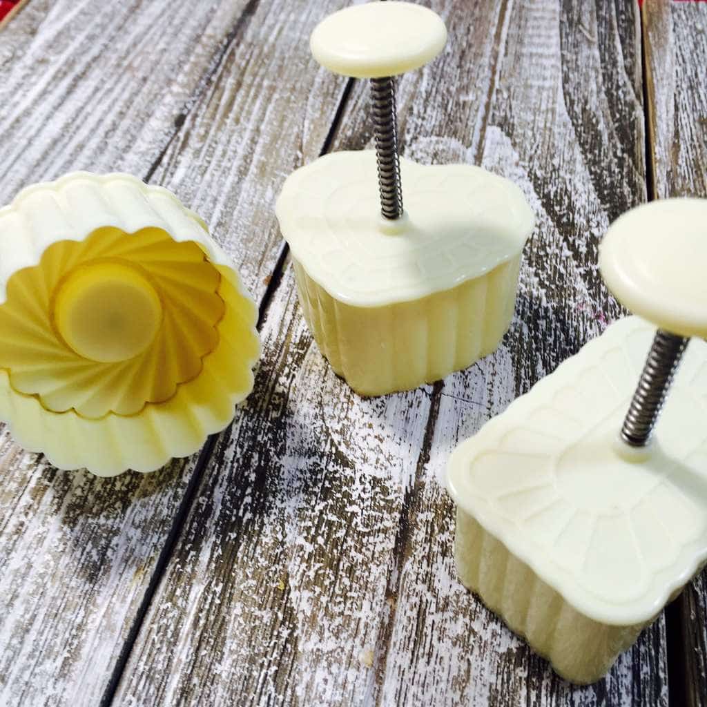 cookie stamps on a wooden table